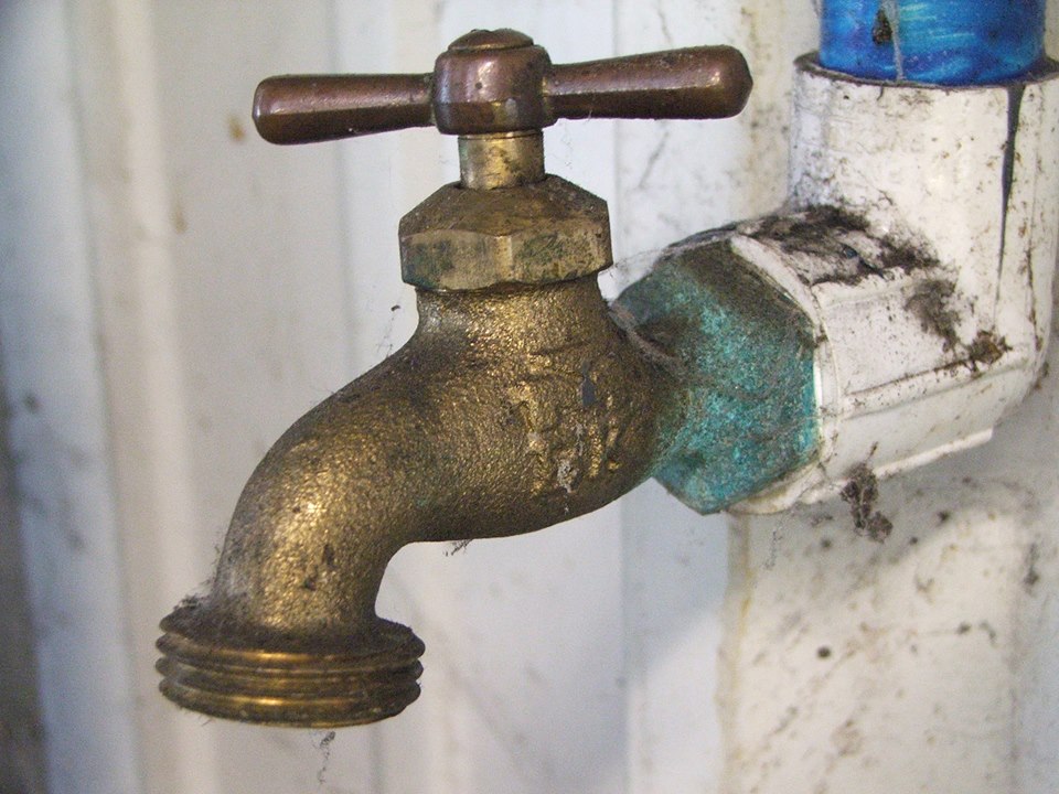 IT'S A RUSTY FAUCET